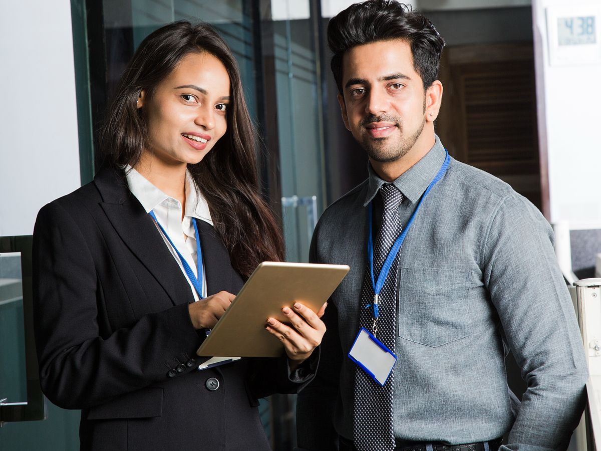 Two Column Inline - Two Indian Business Professionals in Office