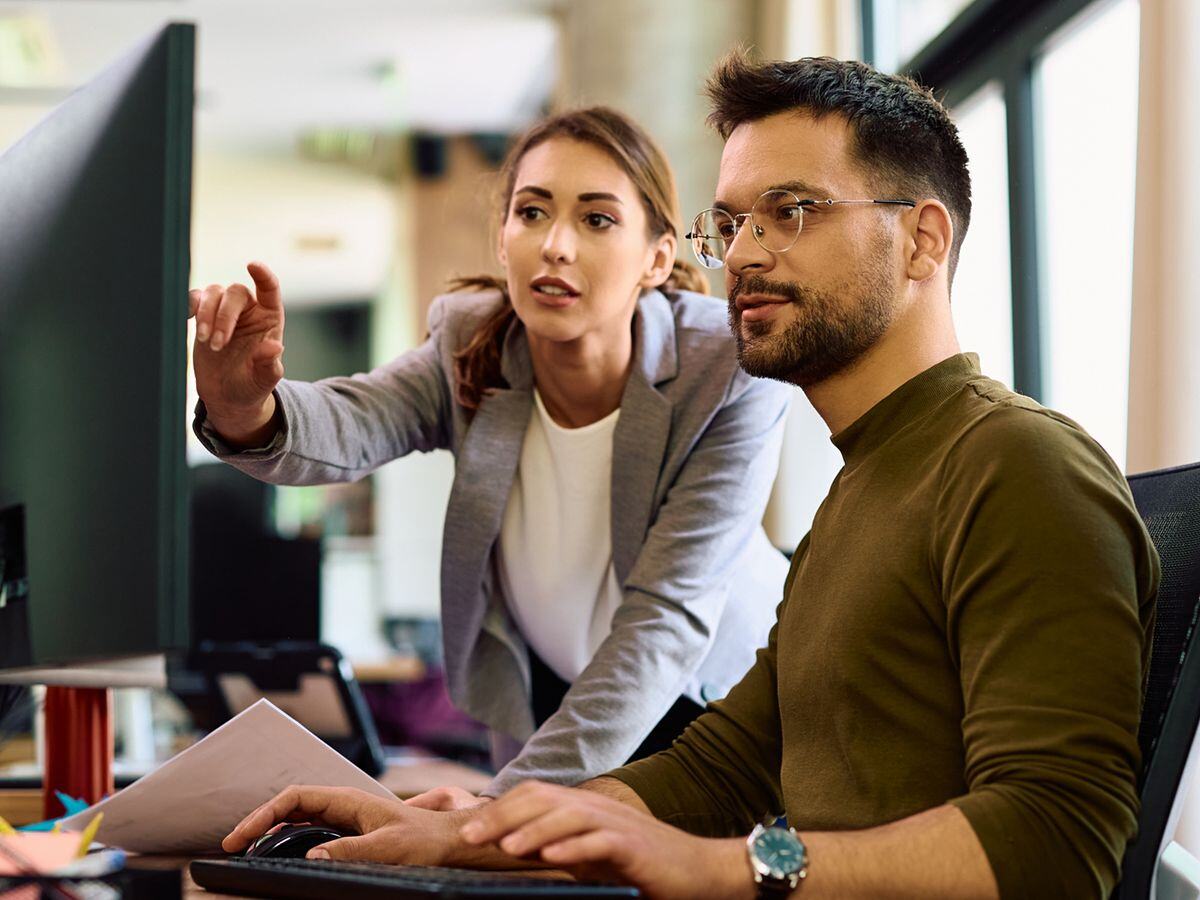 Two-column - Colleagues working on data analysis